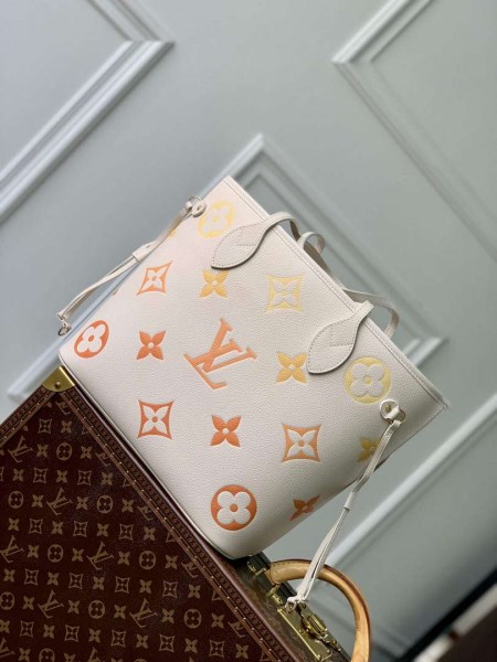 The Louis Vuitton Dog Keychain That's Going Viral This Season 5 LV M46516 Louis Vuitton Neverfull MM Bag