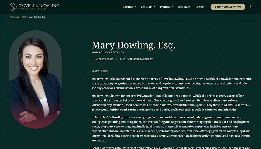 A professional law firm website features a smiling woman with long brown hair in a suit on the left, and attorney Mary Dowlings name, title, contact info, and a professional bio against a green background on the right.