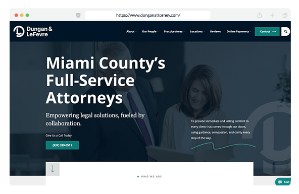 A website homepage for Dungan & LeFevre, advertising Miami County’s full-service attorneys. The site features a dark blue theme, contact info, navigation menu, and an image of two professionals reviewing documents.