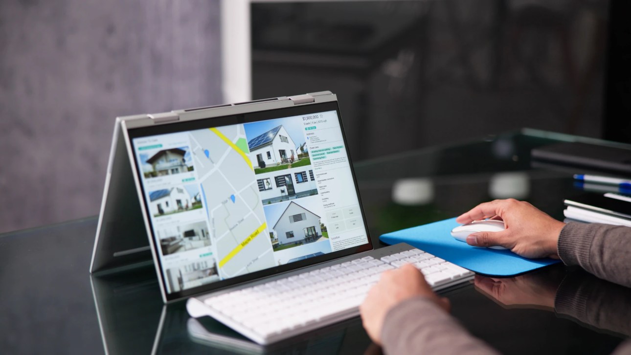 Exclusive agency listing- an agent reviwing a listing data base