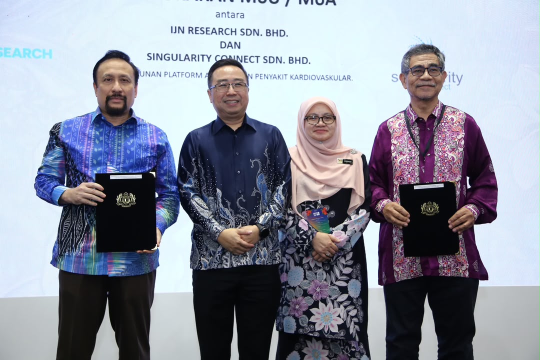 Representatives from IJN Research and Singularity Connect signing a memorandum of understanding to advance agentic AI in healthcare in Malaysia