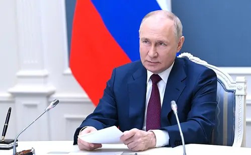 Putin signs law permitting use of army to protect Russians abroad