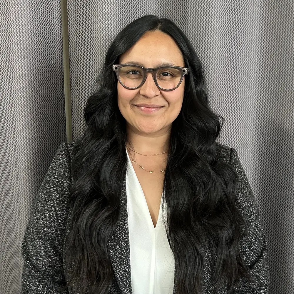 Portrait of Apple Rodriguez, Program Director at Precious Lamb Preschool.