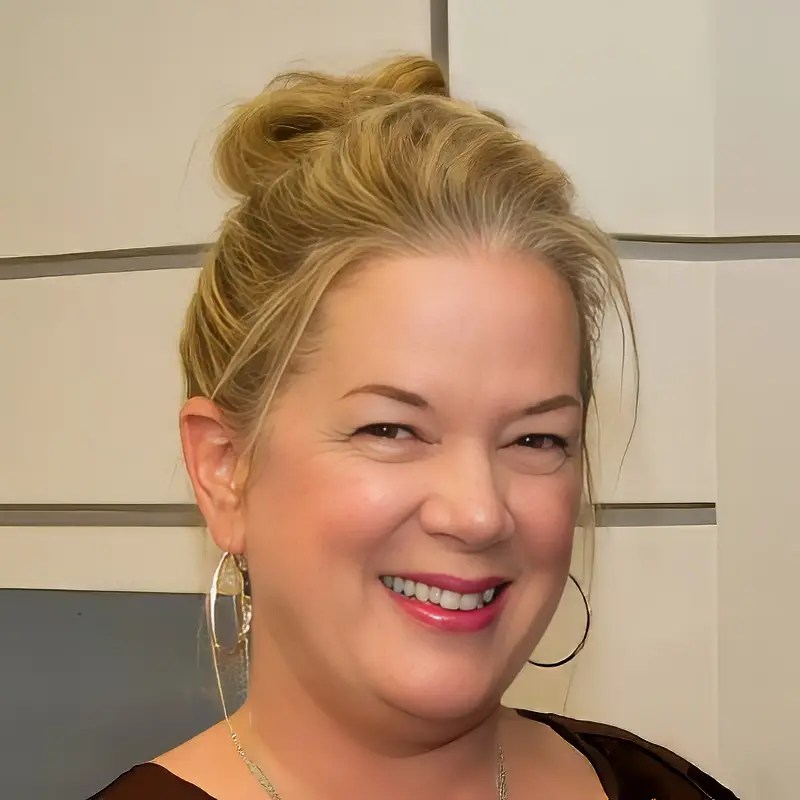 Portrait of Cheri Bazley, Executive Director of Precious Lamb Preschool.