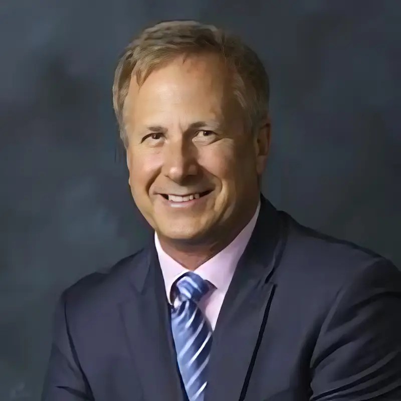 Portrait of Michael Tande, member of the Board of Directors at Precious Lamb Preschool.