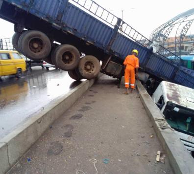 Trailer Plunges Into BRT Terminal From Oshodi Bridge