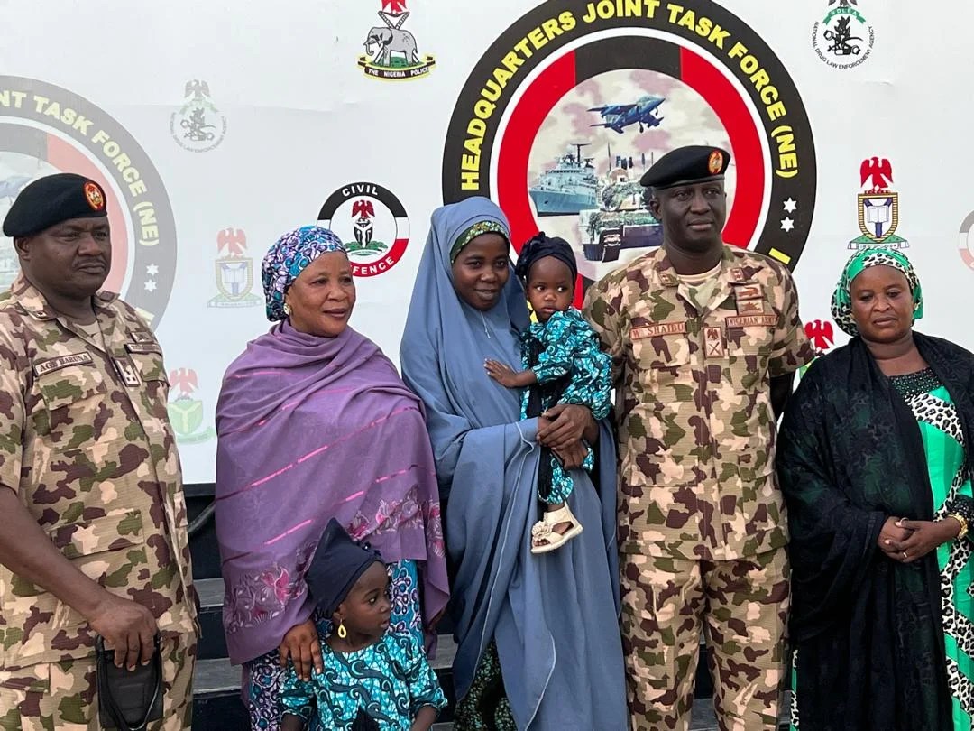 Army hands over rescued chibok girl, her three children to Borno govt