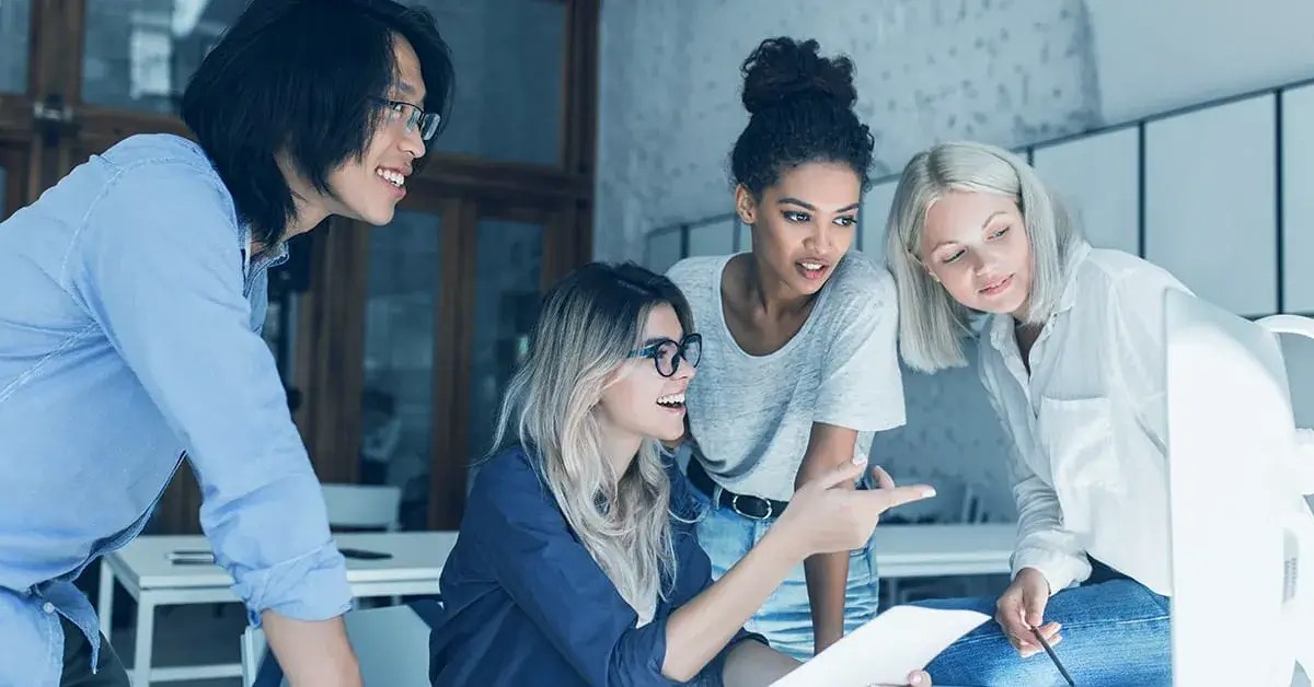 A person showing coworkers how to improve their WordPress site search.