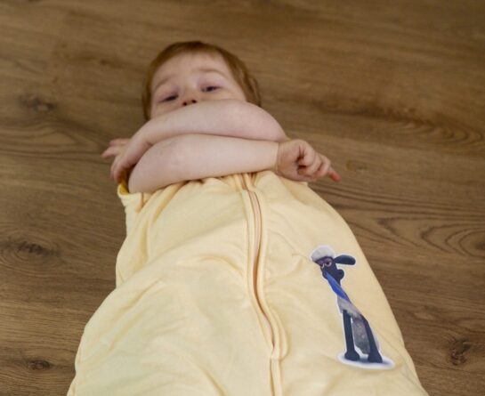 Keeping Snug With a Shaun the Sheep Sleeping Bag From Slumbersac