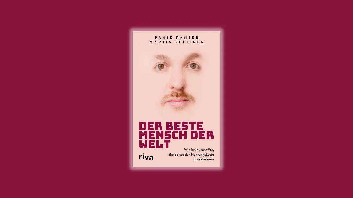 Vom Kassierer aus dem Musikvideo Ölsardinenindustrie seines Bruders Danger Dan zum Der beste Mensch der Welt oder wie es im Untertitel heißt „Wie ich es schaffte, die Spitze der Nahrungskette zu erklimmen“.