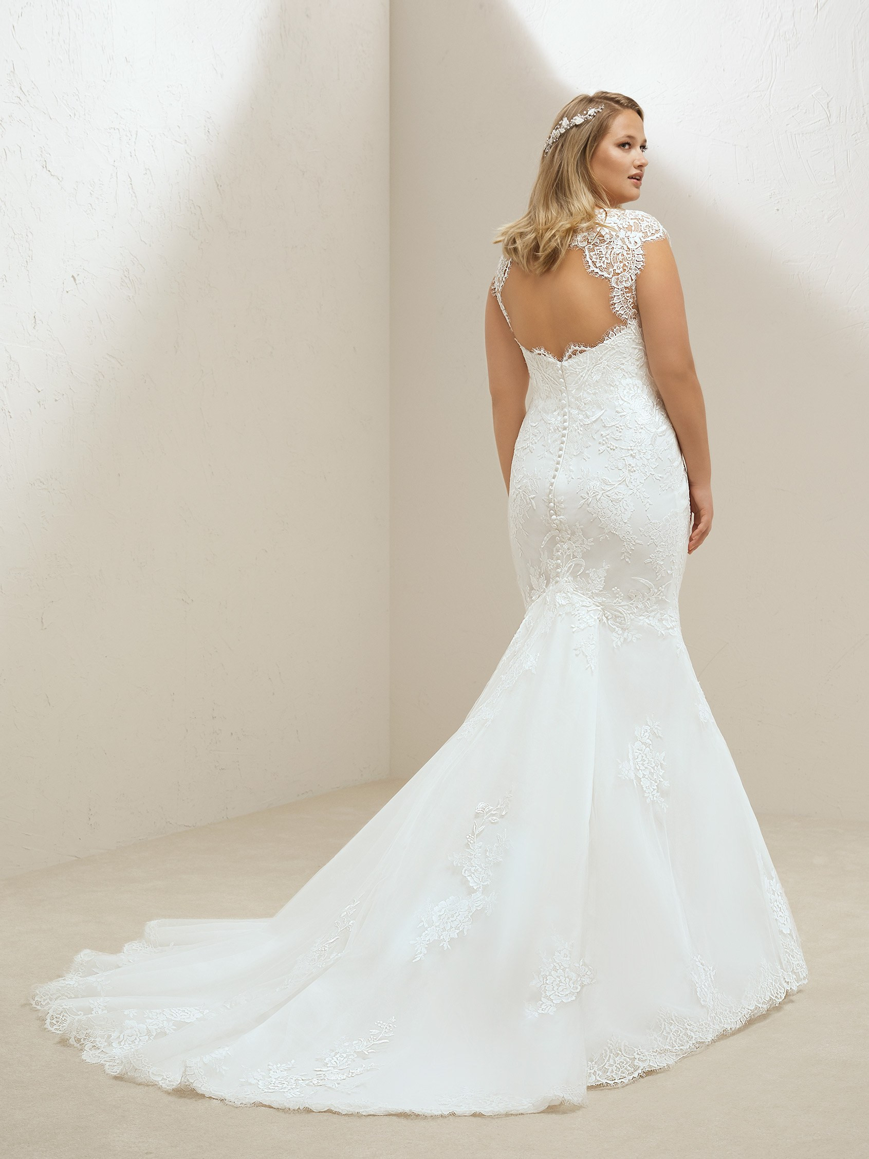 Plus size wedding dress designer