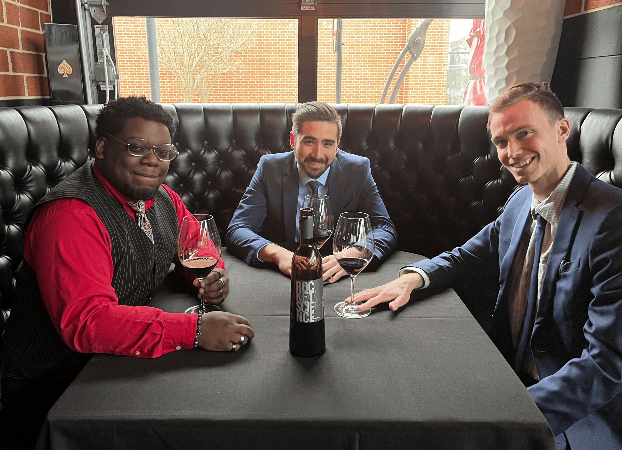 Members of management sitting at a table