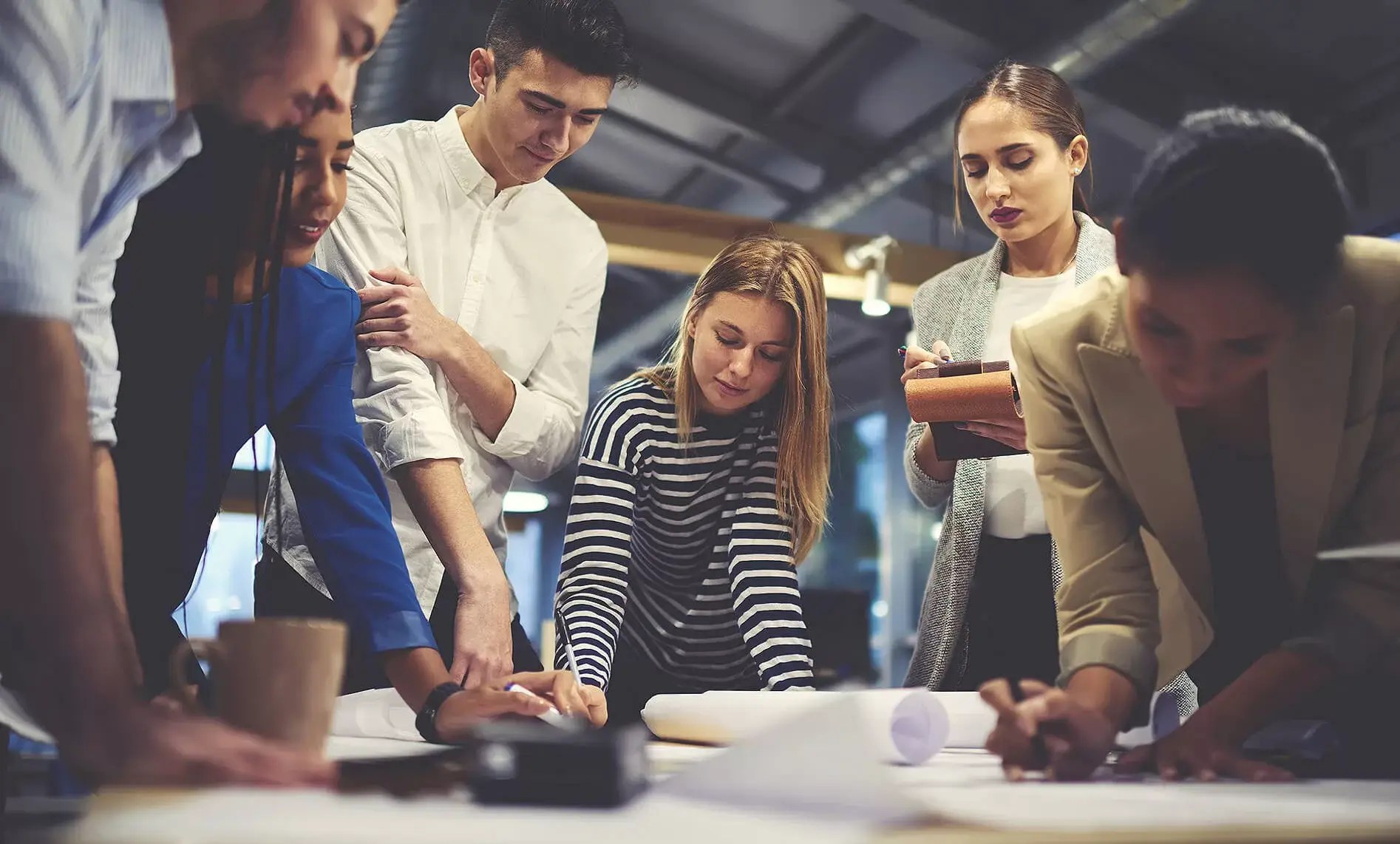 young woman leading a small business marketing workshop
