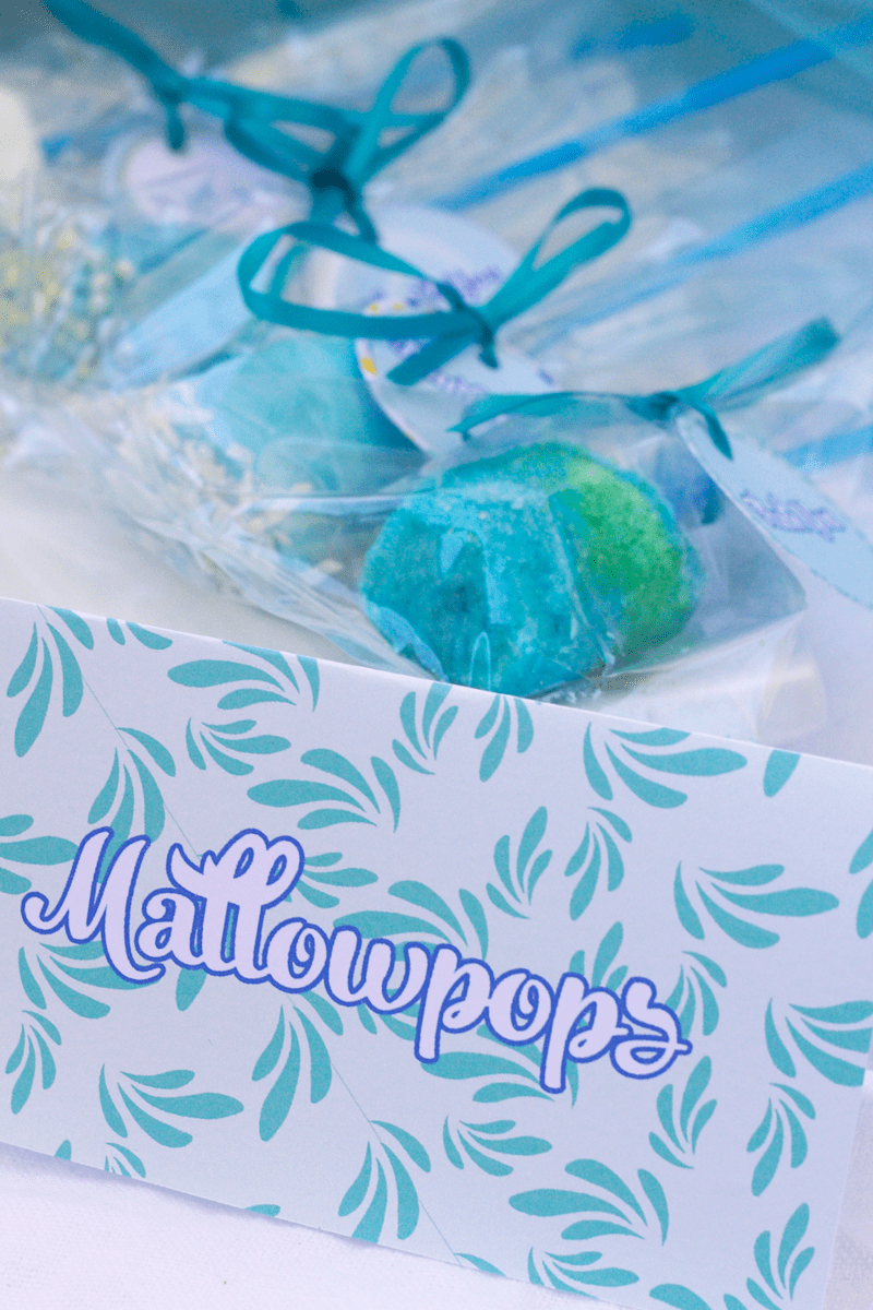 This is an image of twisting by the pool tent cards.