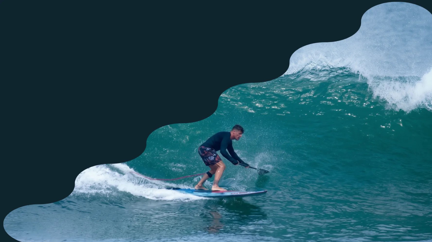 SUP surfer on a wave in Bali