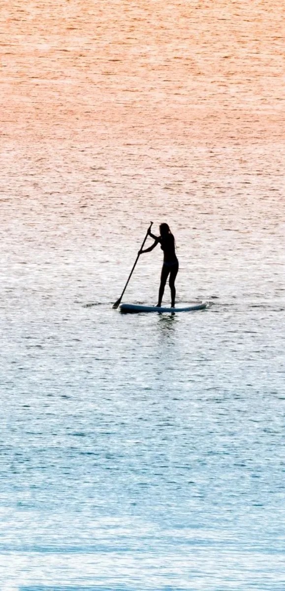 Stand up paddling on calm water in Bali