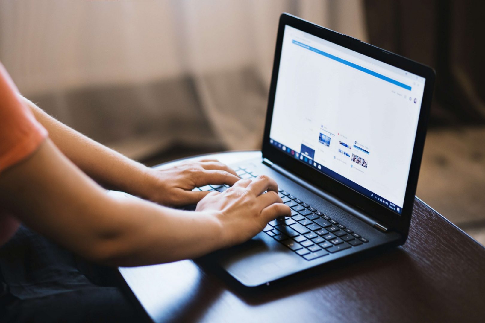 Image of someone typing onto an open keyboard, searching for a counsellor
