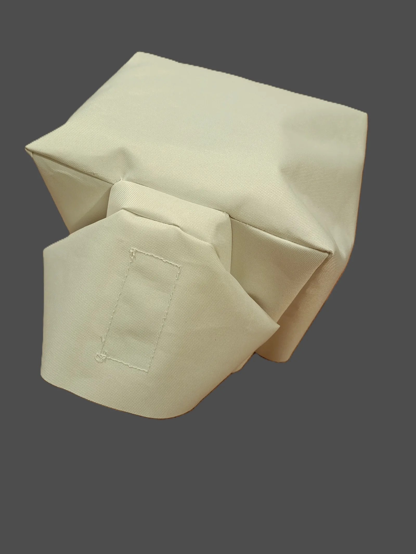 White equipment cover with shaped openings