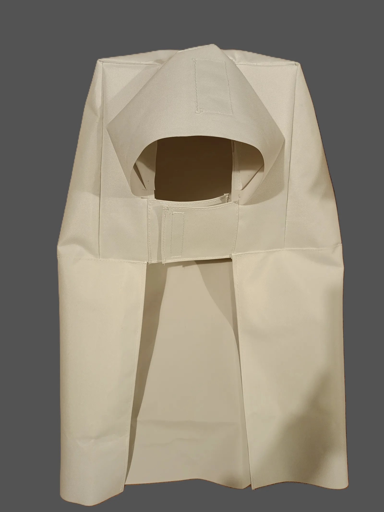 White equipment cover with shaped openings