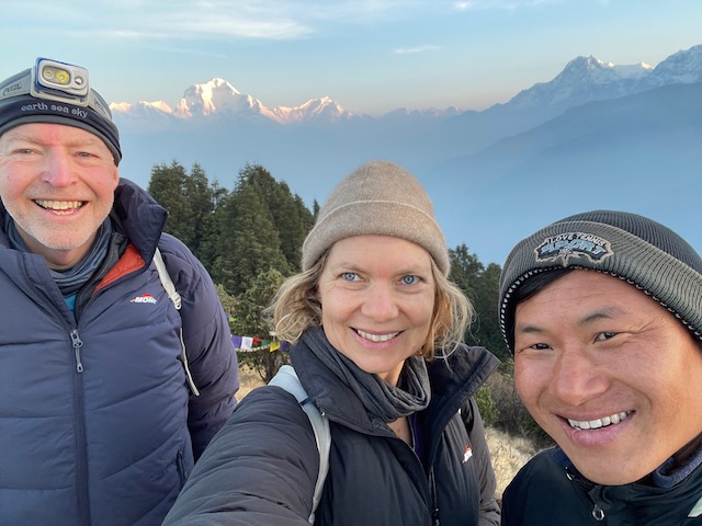 Trevor, Emma and our guide, Bhim, at Poon Hill with Dhaulagiri in the background
