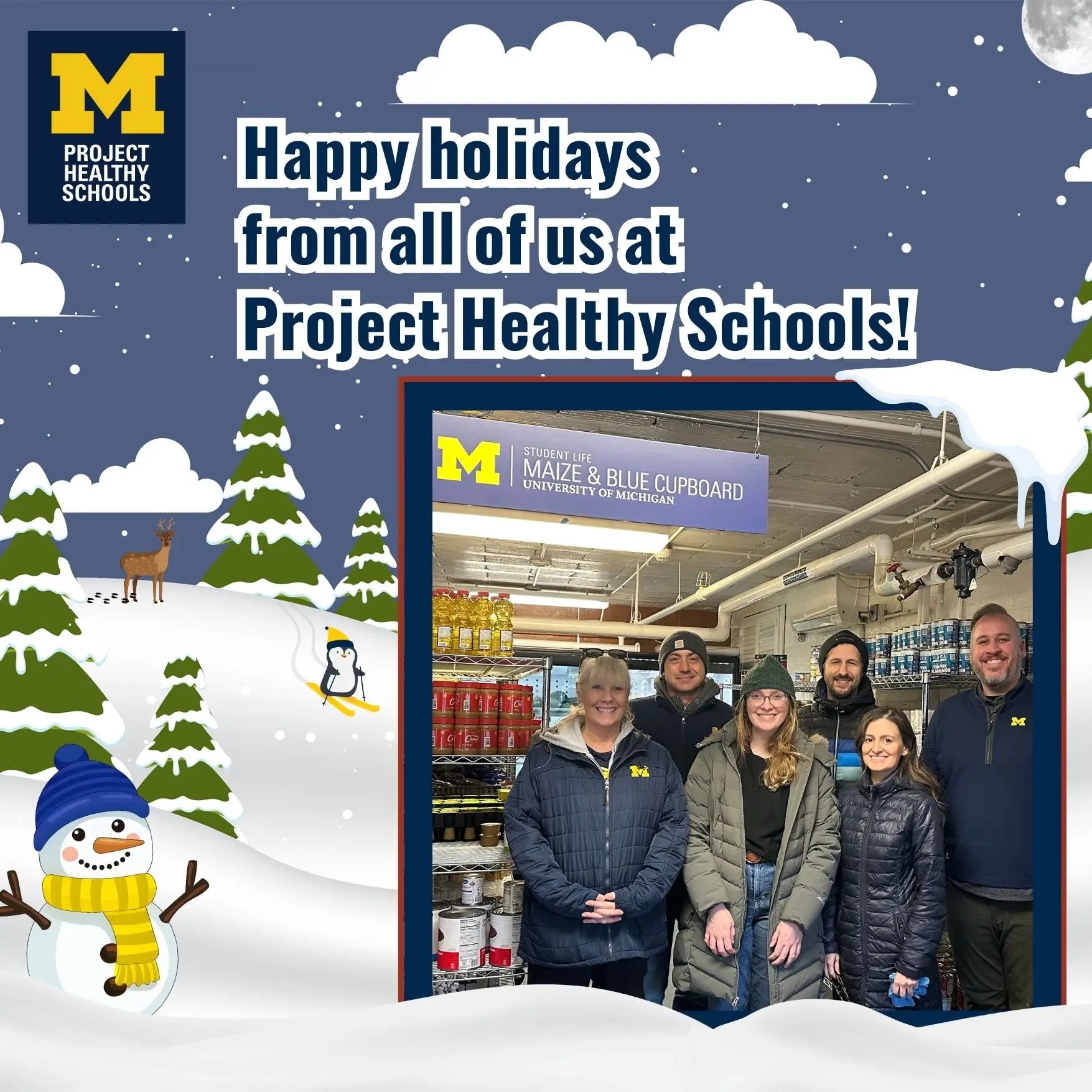 phs-team-posing-for-photo-while-volunteering-at-umich-food-bank