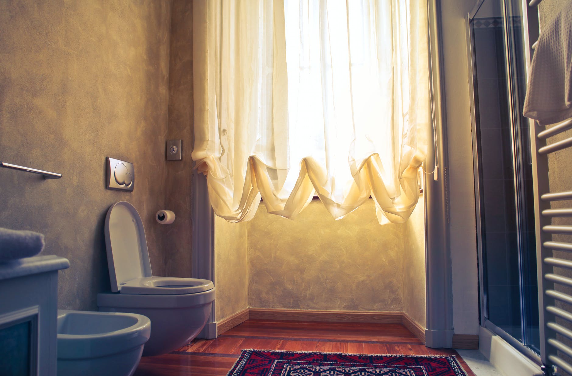 white ceramic toilet bowl