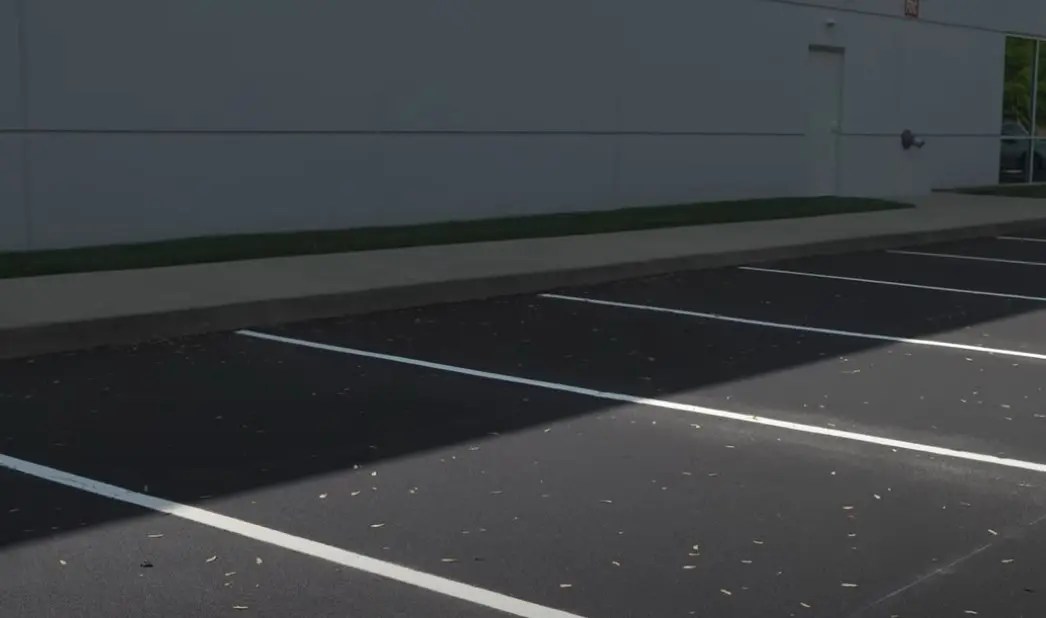 Empty parking lot with shadows