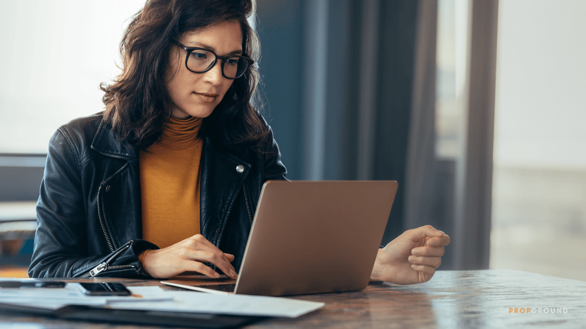 Agent working on a real estate software setup on a laptop
