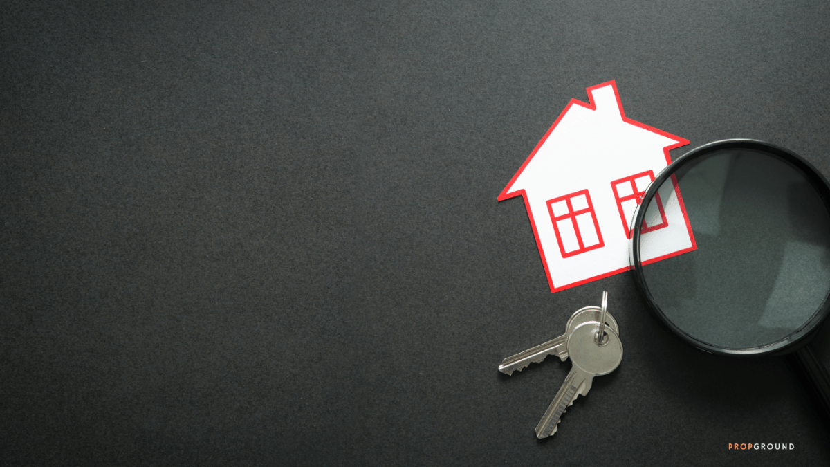 House icon with magnifying glass and keys representing real estate search and property leads
