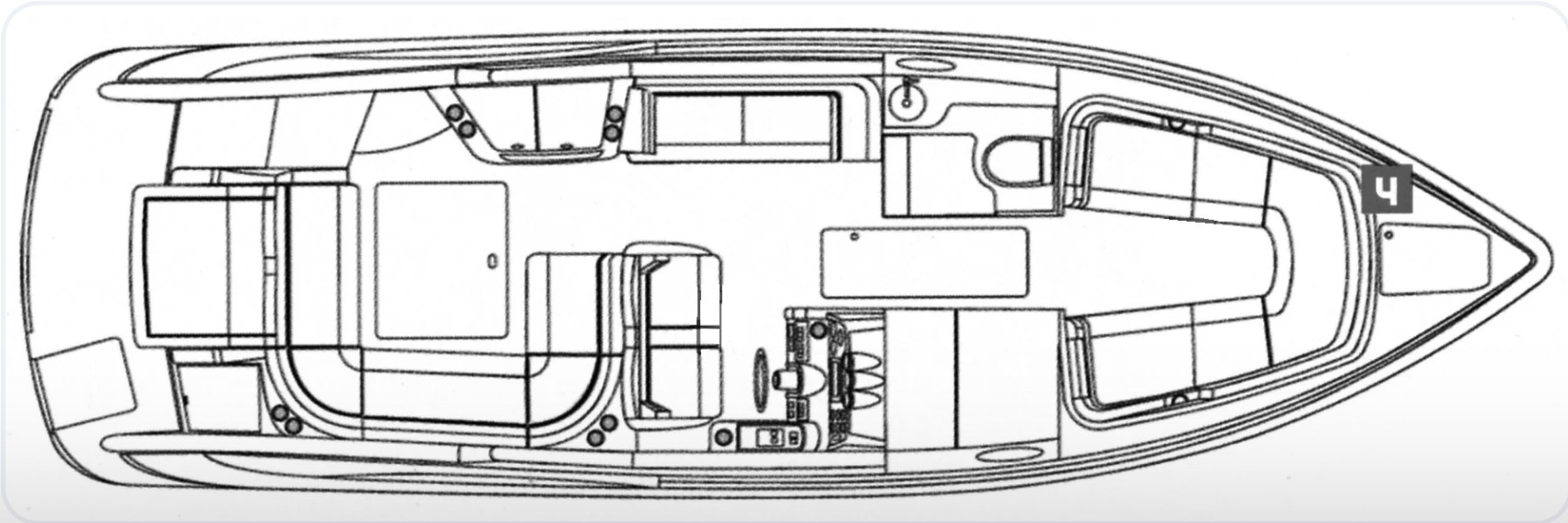Top-down layout of a boat interior with multiple seating areas, helm at center, and engine compartment toward the middle.