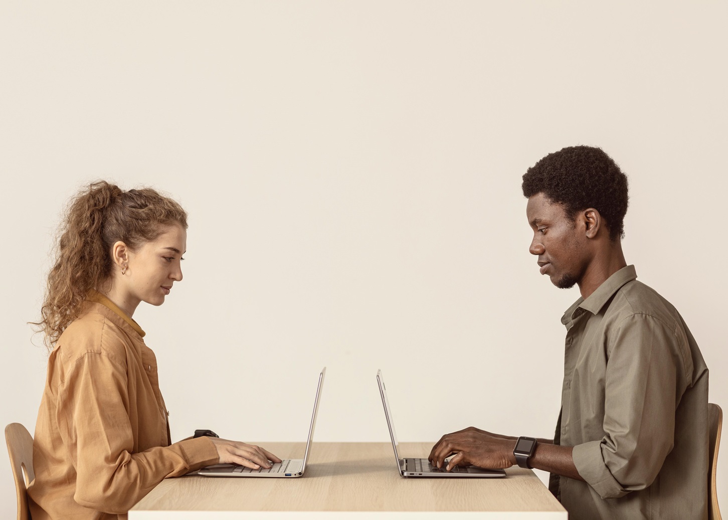 colleagues-working-their-laptops