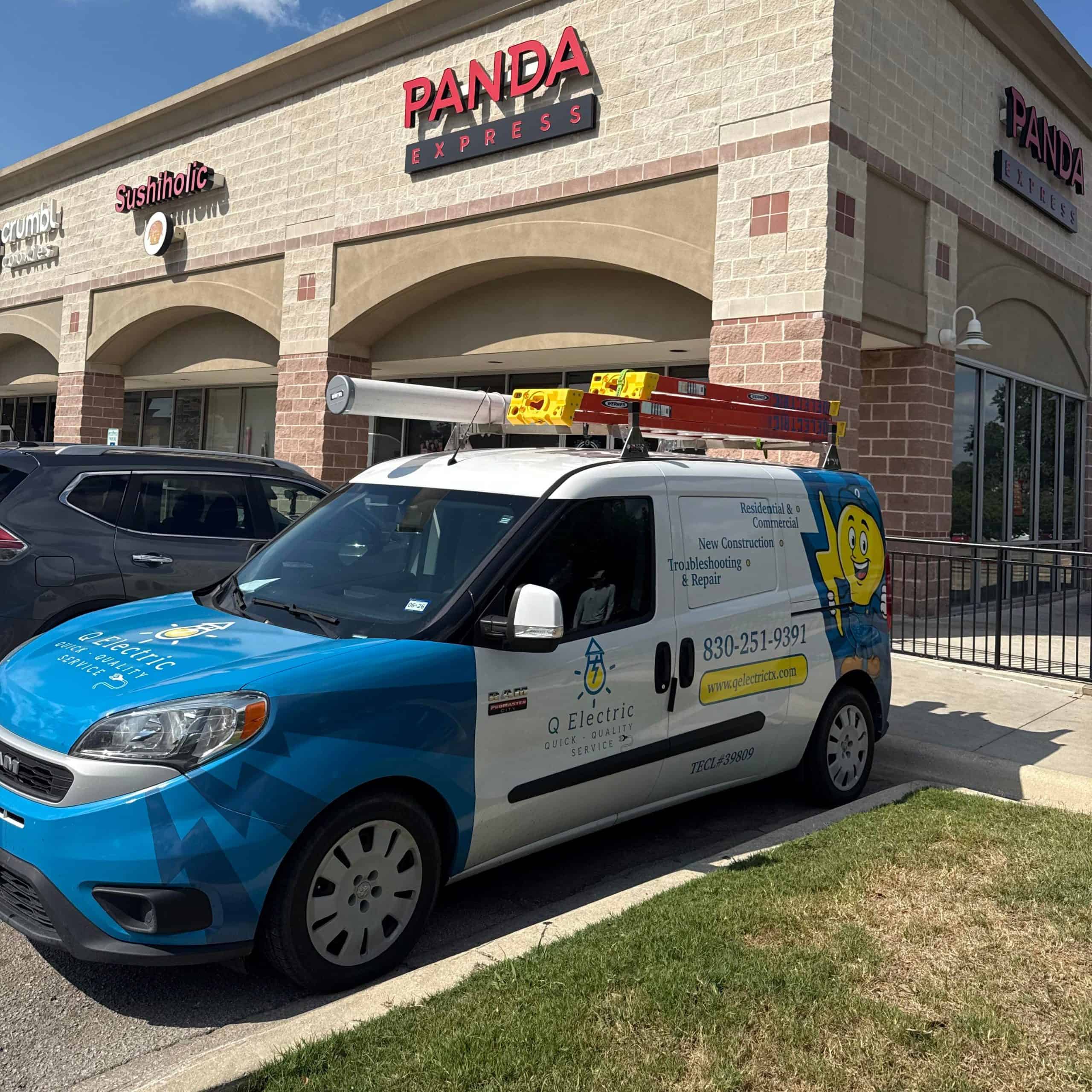 Q Electric van parked in front of Panda Express