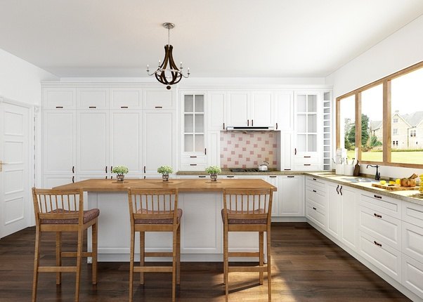 Rmser laylapalmer gives her cheap oak kitchen cabinets an upscale look by adding molding to the top and paint. In a small kitchen should the wall cabinets go up to the ceiling even if it makes the space even ...