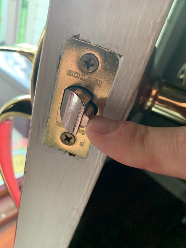 At an angle, slide the edge of your card between the door and the strike plate in addition to using an actual credit card to unlock doors, there are various lock picking sets that can fit inside your wallet. Is it possible to pick a door lock by physically inserting a credit card between the door and ...