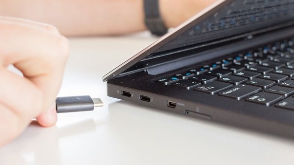 The output of the charger can be varied to suit any usb c compatible device. Could I charge a Dell Latitude 7370 with any USB C charger