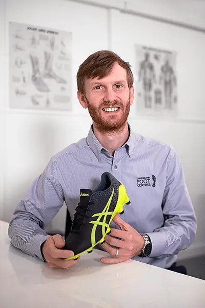 Headshot photograph of William Henneken, a Podiatrist from Queensland Foot Centres