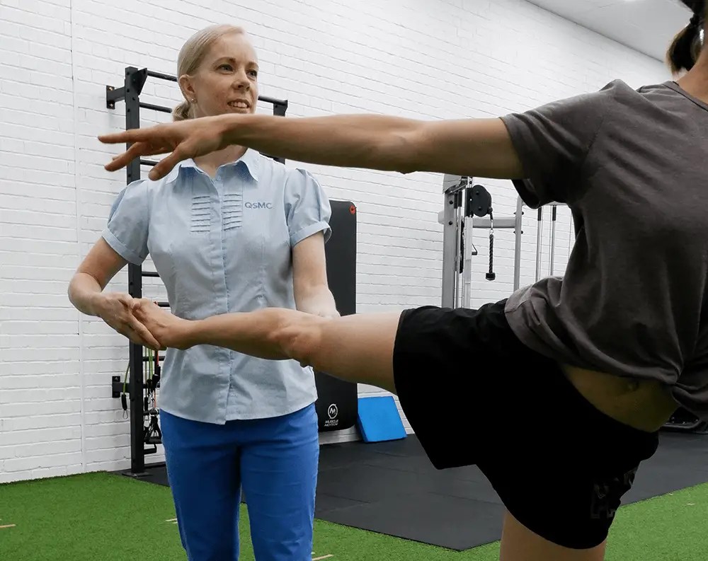 Melanie Fuller and a professional ballet dancer during a dance physiotherapy appointment