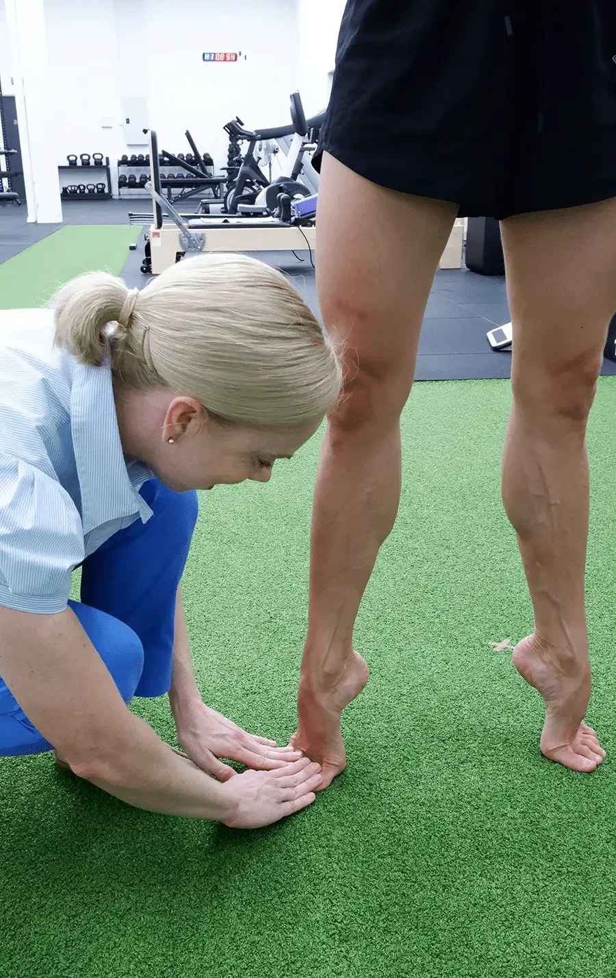 Melanie Fuller checking the feet of a ballet dancer during a Dance Physio appointment