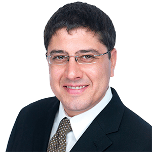 Man in suit wearing glasses