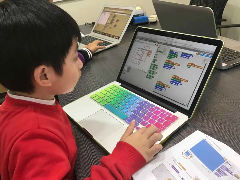 Block-based code on screen during a coding class