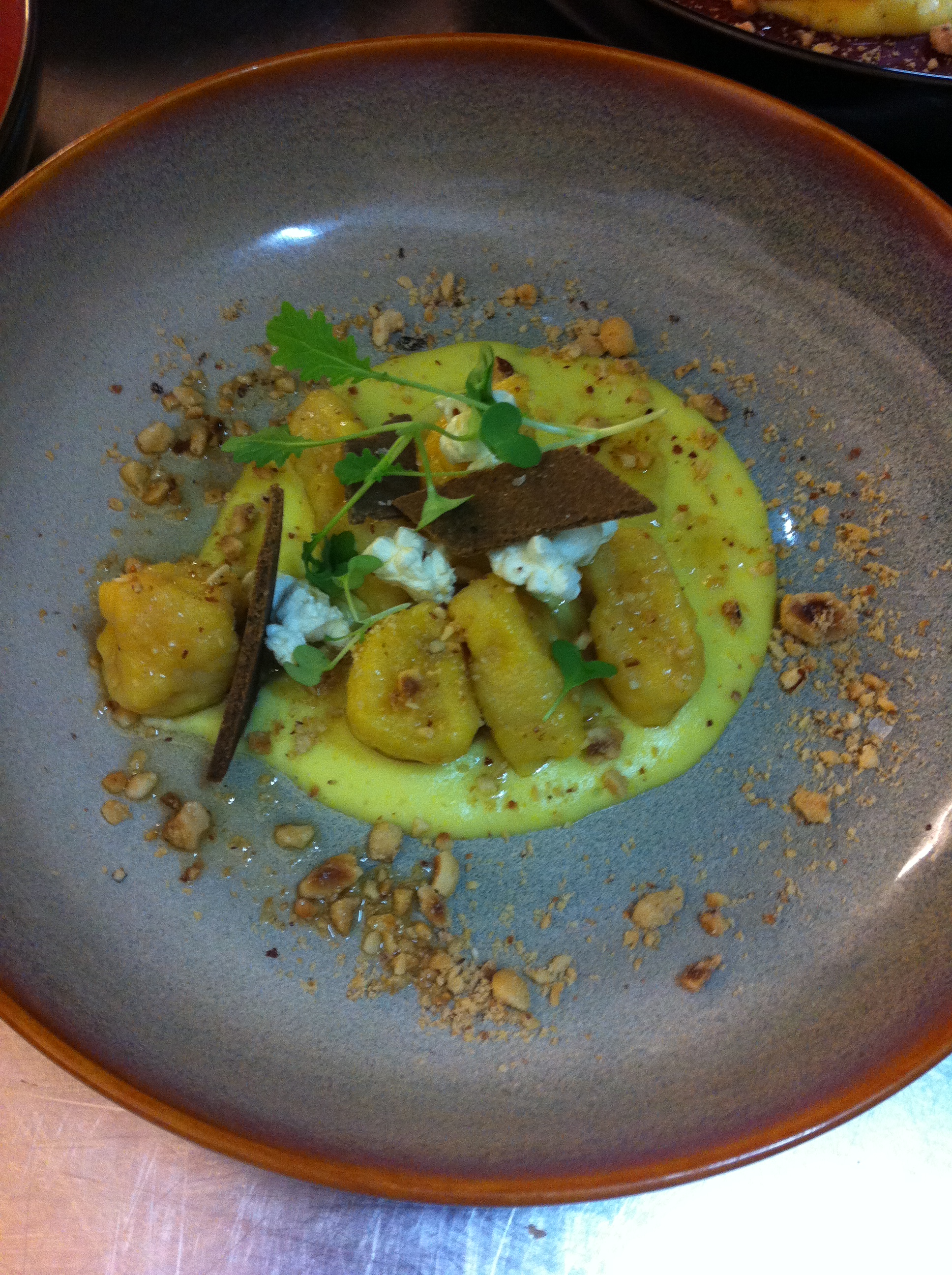 Squash and Ricotta Gnocchi, Corn Soubise, Shaved Pemmican, Toasted Hazelnuts