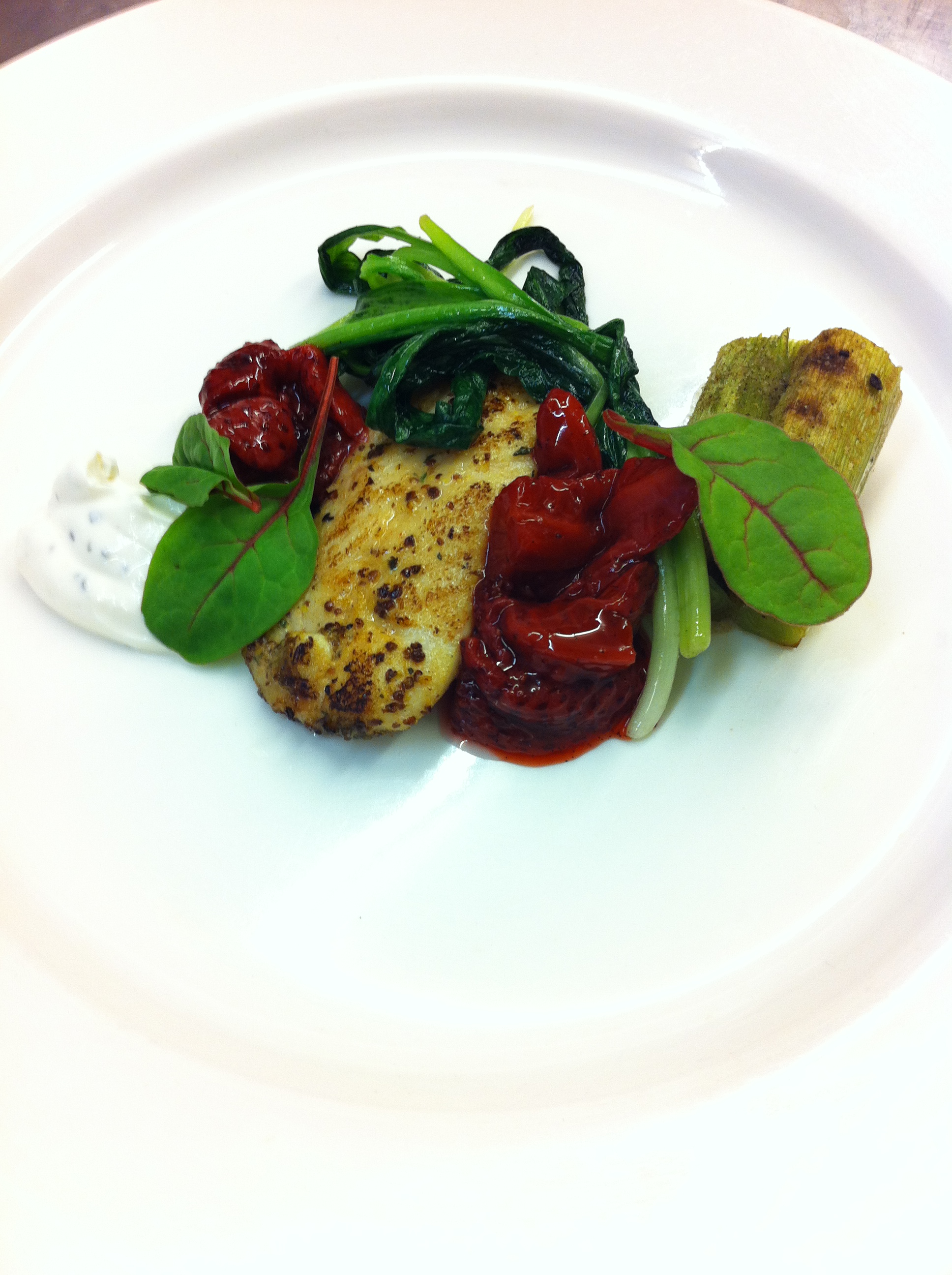 Cedar plank red fish, roast strawberry, charred leek, ramps, rosemary lebna
