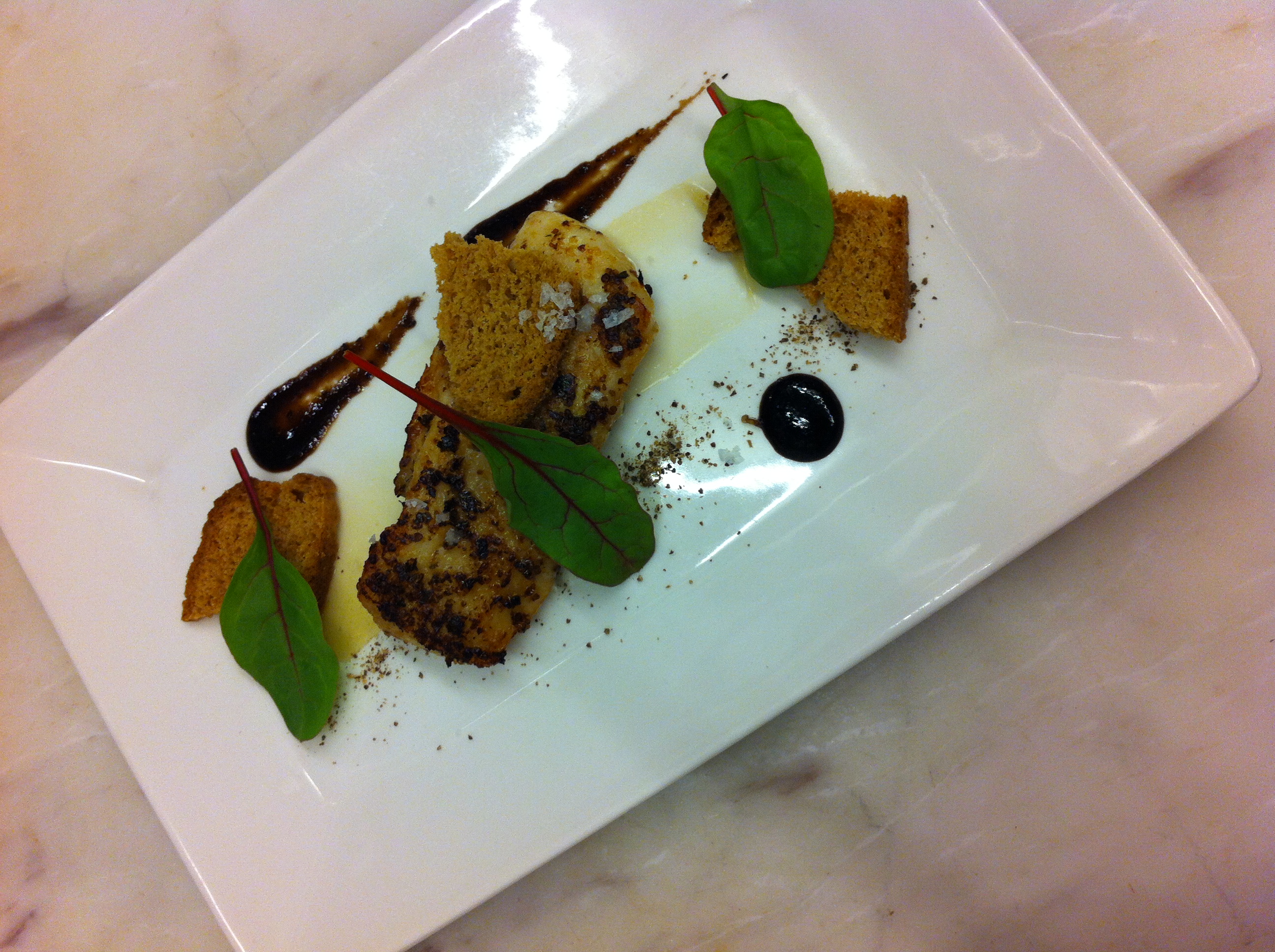 Broiled red fish, blueberry molasses, bannock chips, mushroom dust.