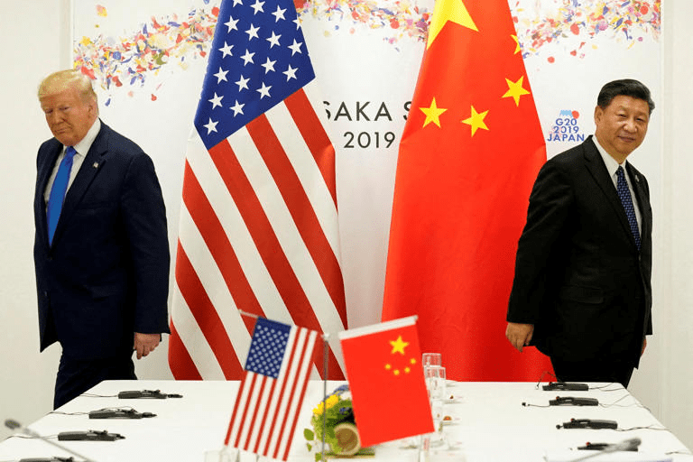 China Vows Retaliation as Trump Threatens 100% Tariffs