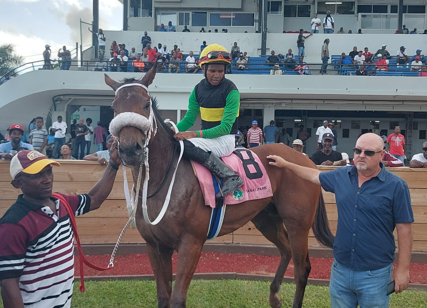Trainer Anthony Nunes (right) with Supremasi. The jockey is Raddesh Roman.