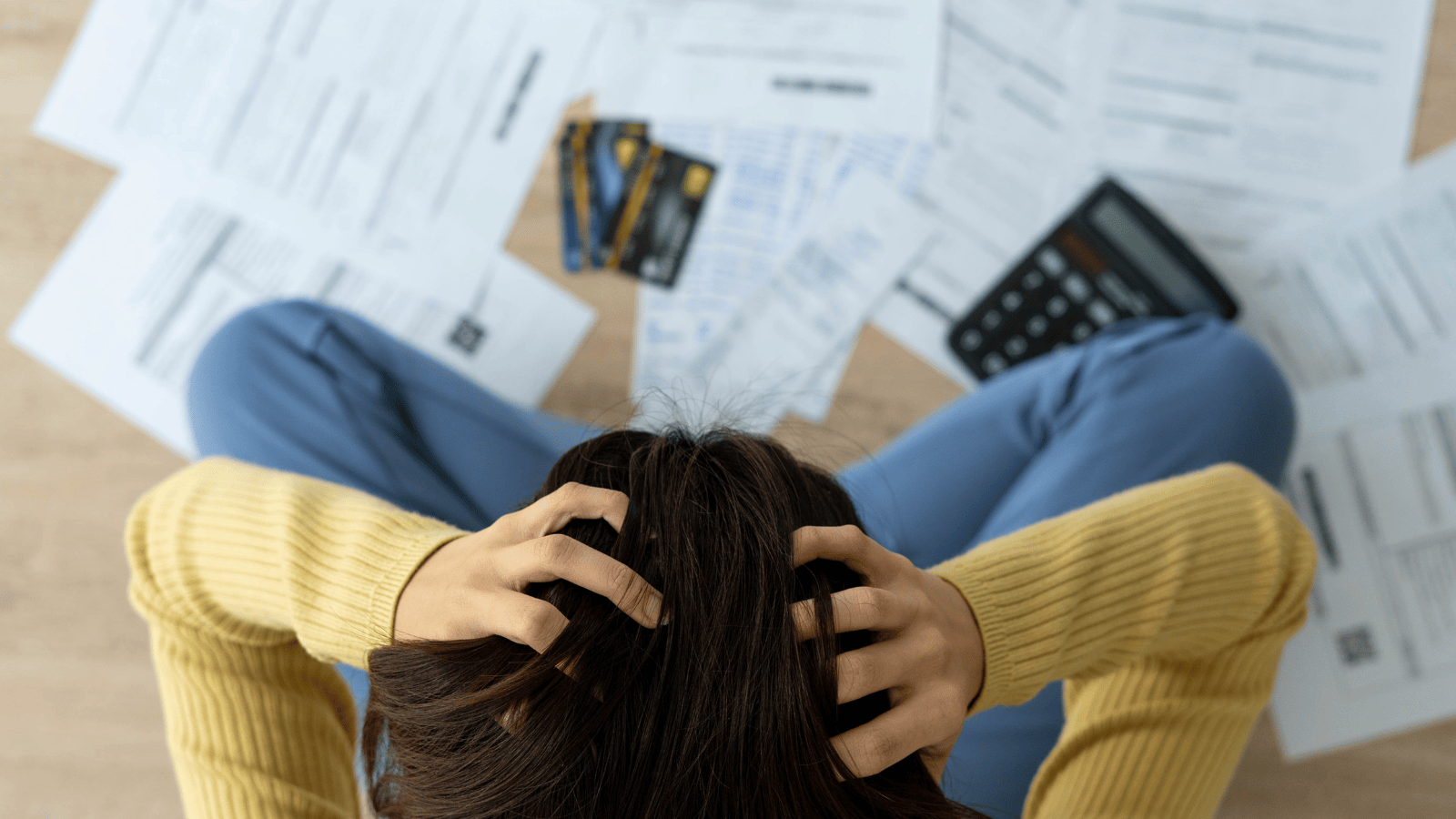 person struggling with bills