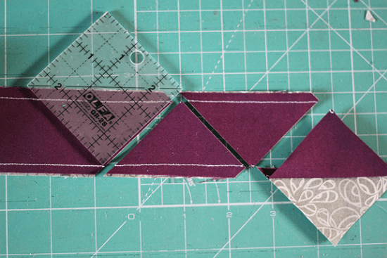 Step 3 · cut along the second side of the ruler . Make Half Square Triangles From Strips Of Fabric Quilting Digest