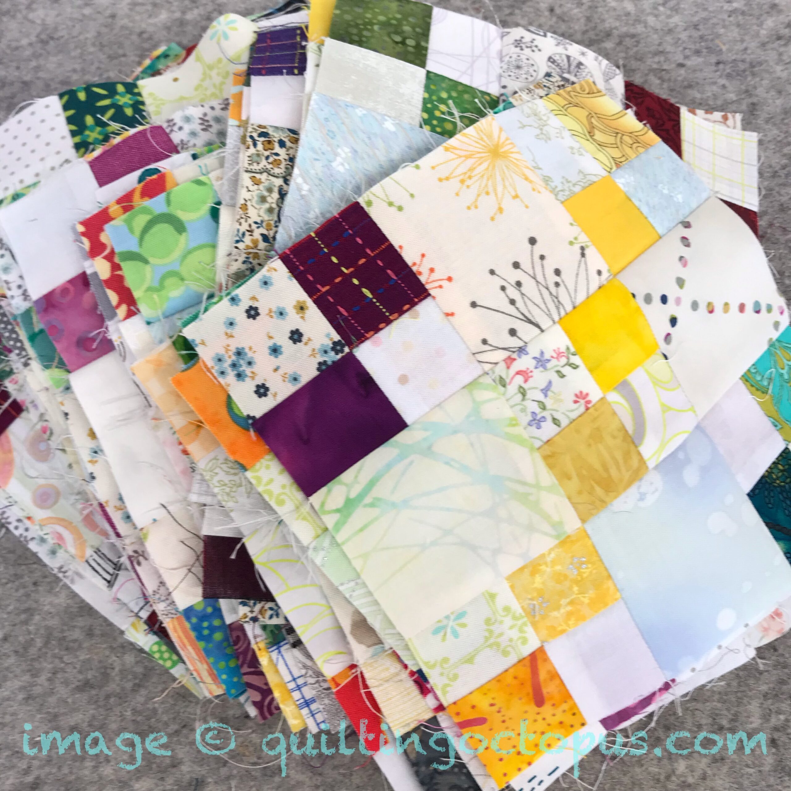 scrappy rainbow coloured patchwork blocks