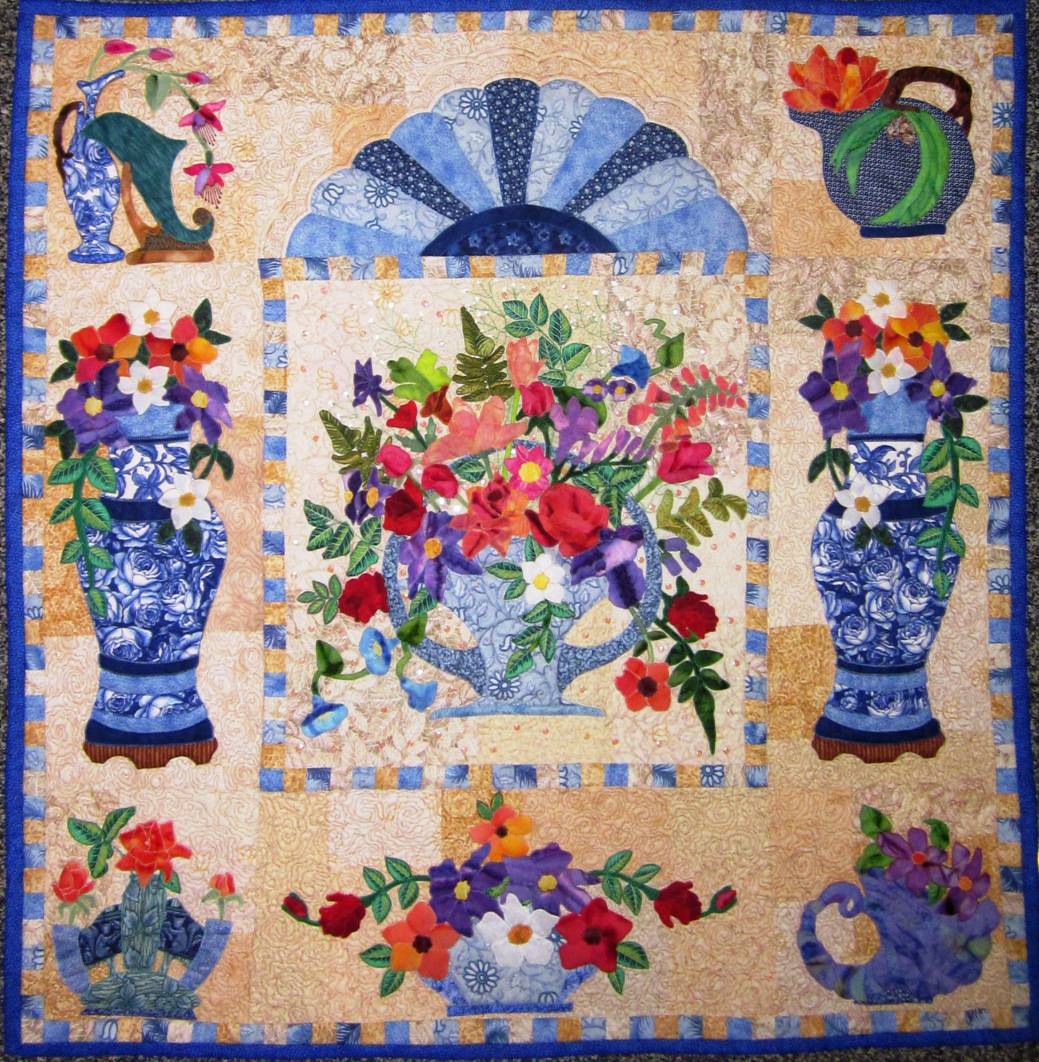 Roseville is a pattern by Maggie Walker. A beautiful floral art quilt with many small appliqués flowers.