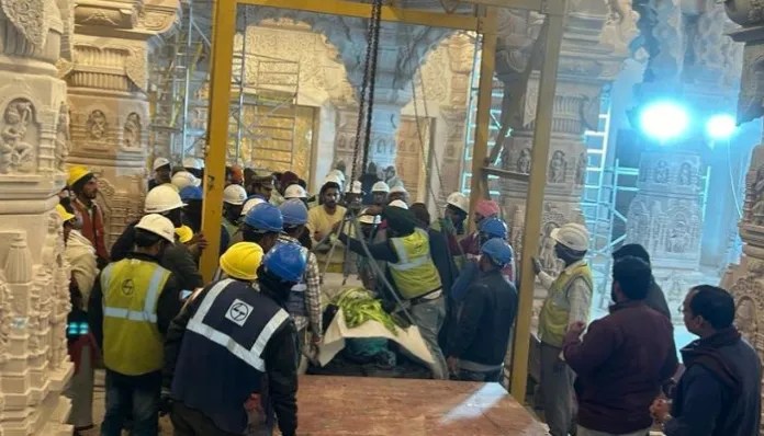 ayodhya ram statue in temple ram lalla idol crane lifted installed in garbha griha ayodhya temple